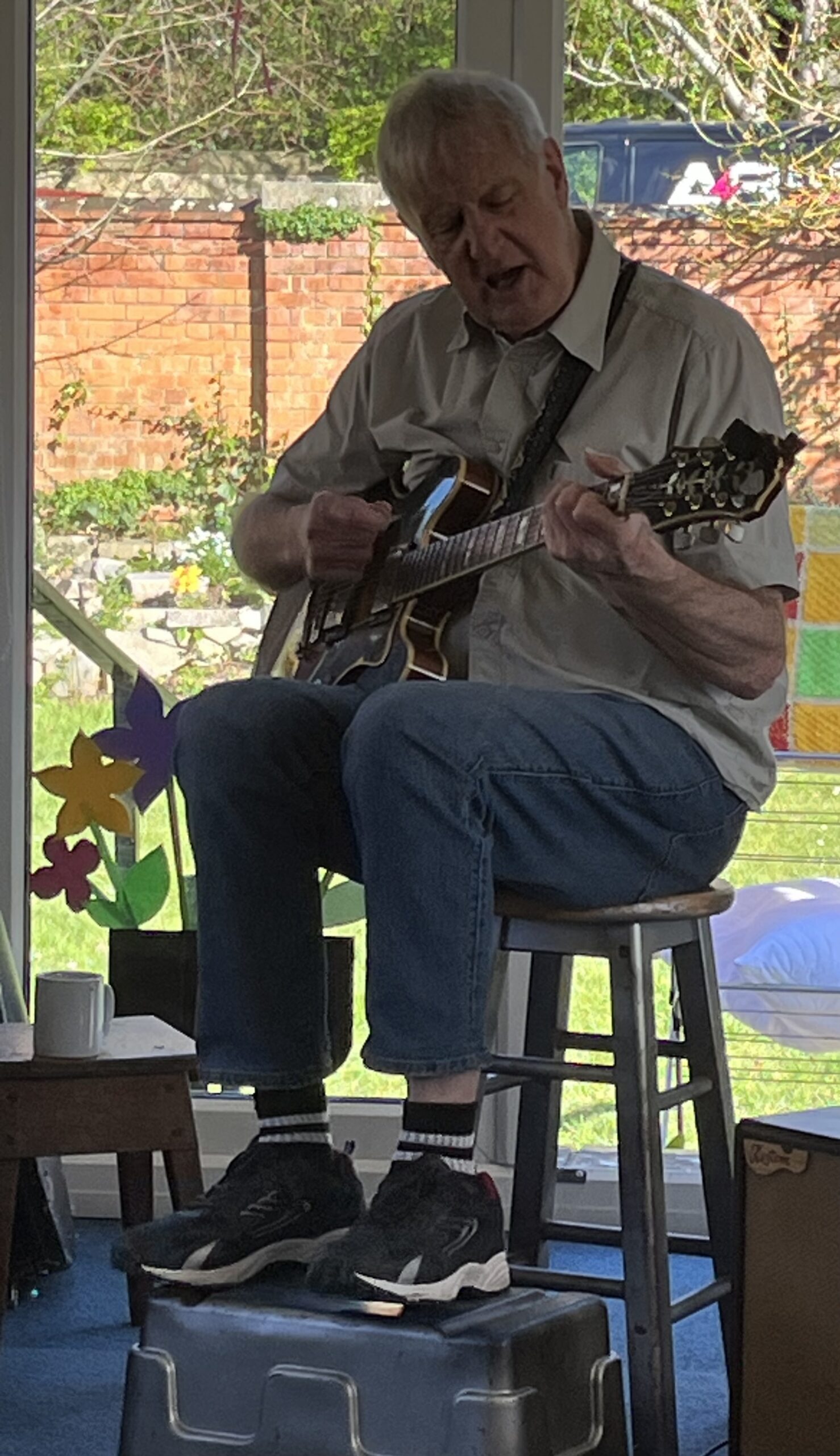 Chris on his guitar
