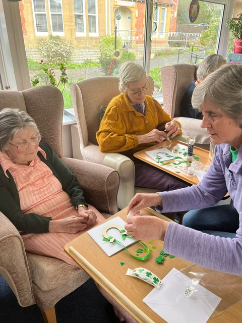 Group of residents making the charm decorations