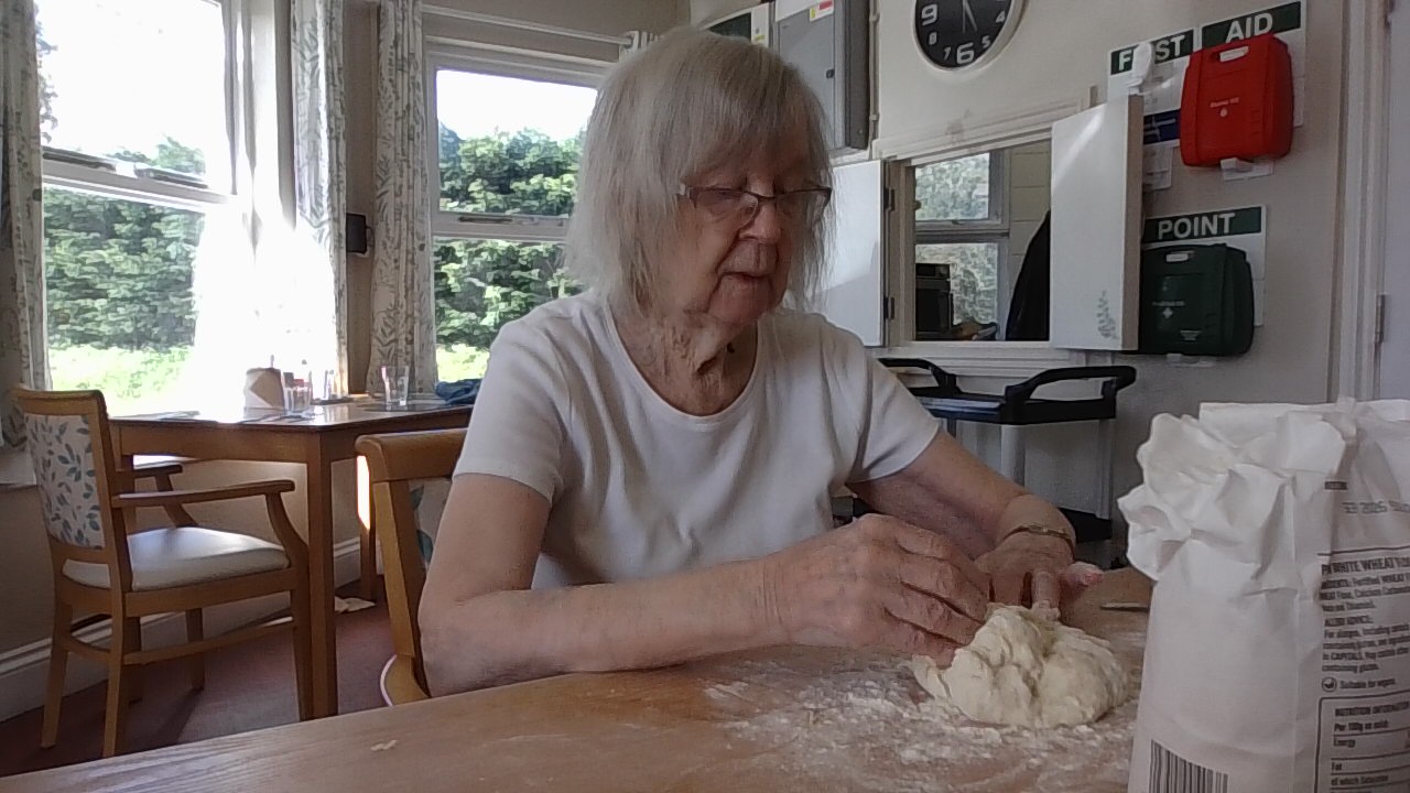 Resident kneading bread dough