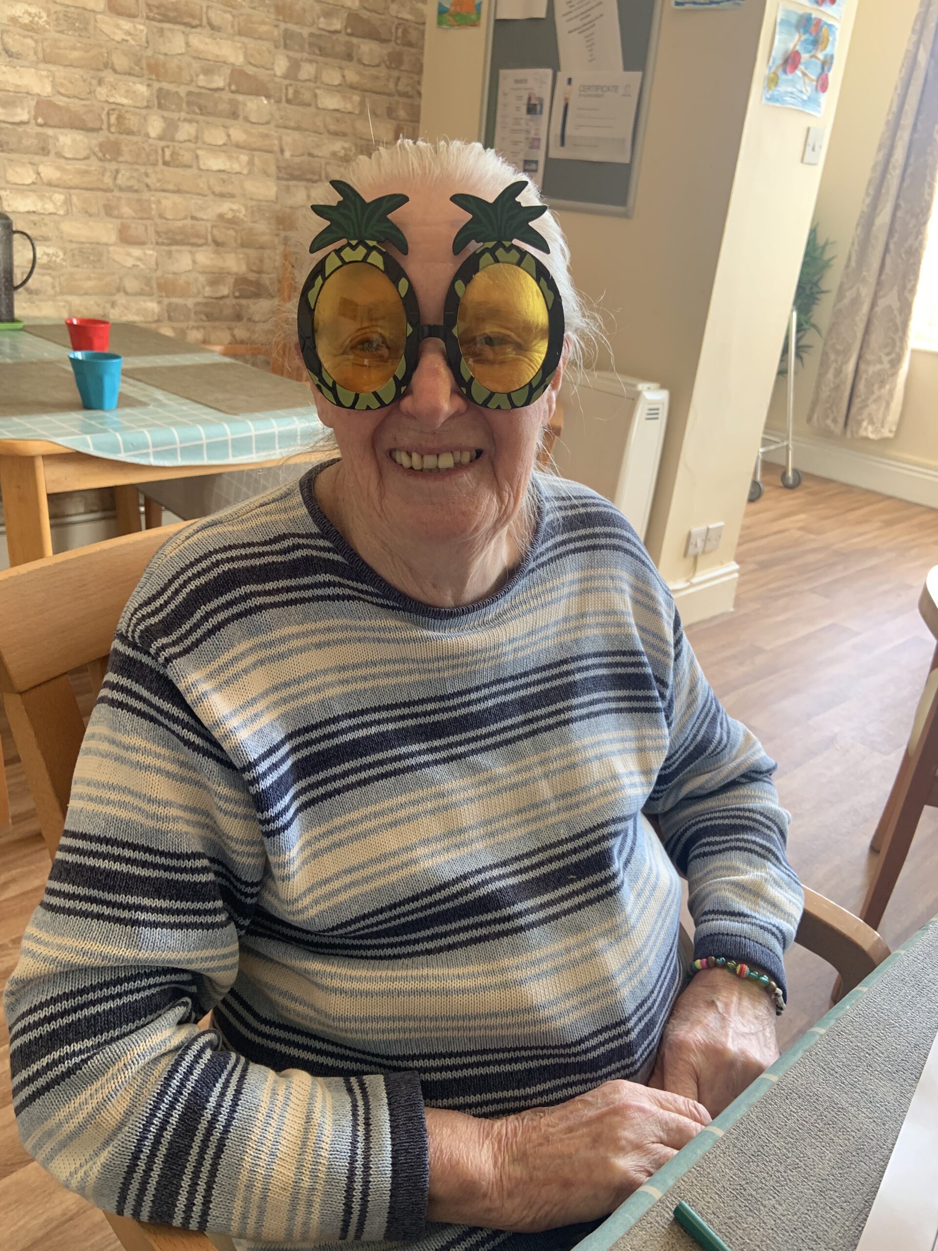 Resident wearing homemade Elton John glasses 3