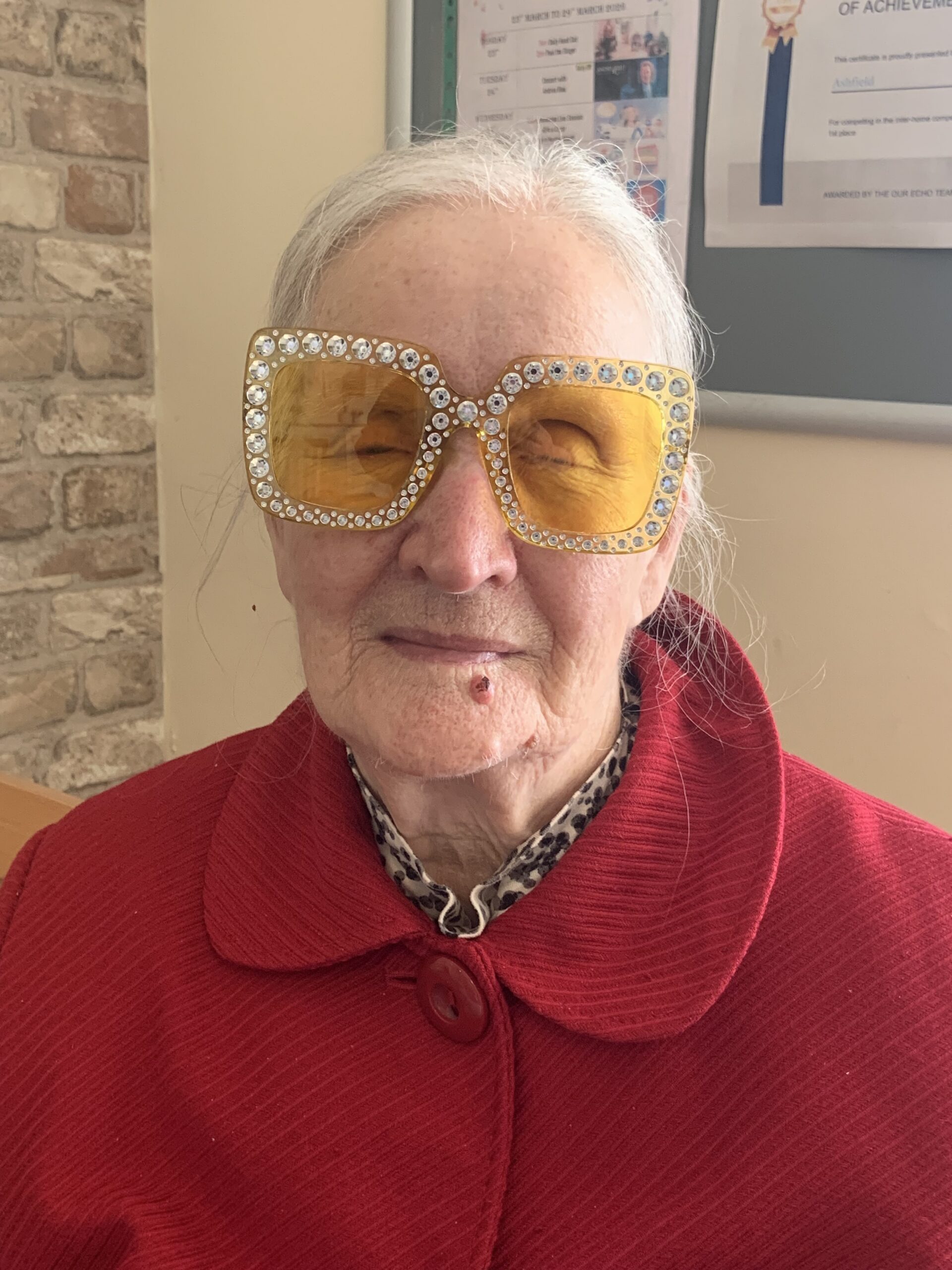 Resident wearing homemade Elton John glasses