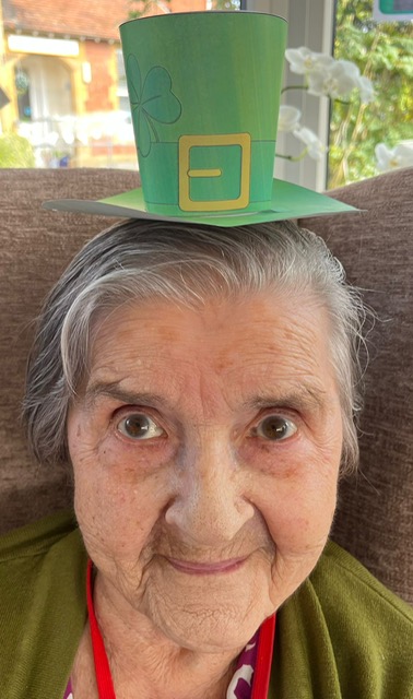 Resident wearing homemade leprechaun hat 5
