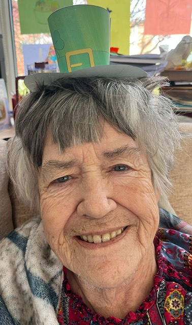 Resident wearing homemade leprechaun hat 6