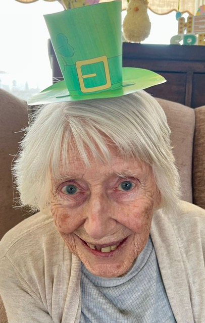 Resident wearing homemade leprechaun hat