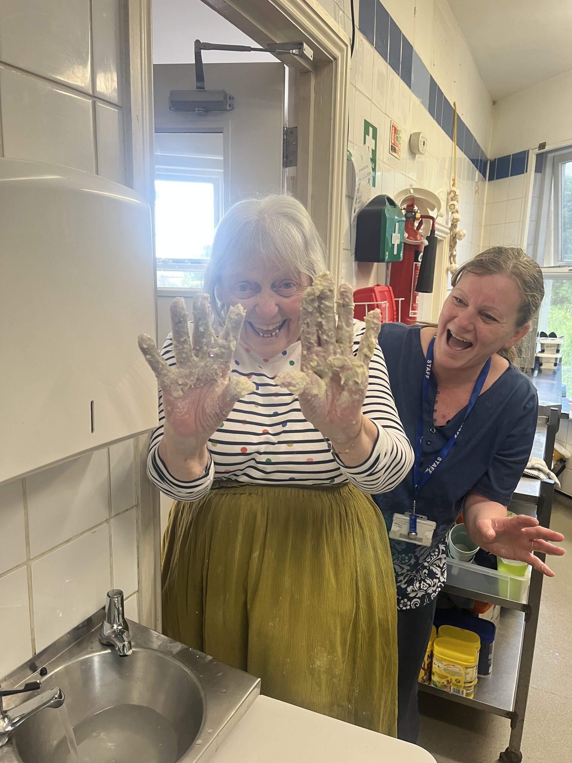 Resident with sticky dough hands