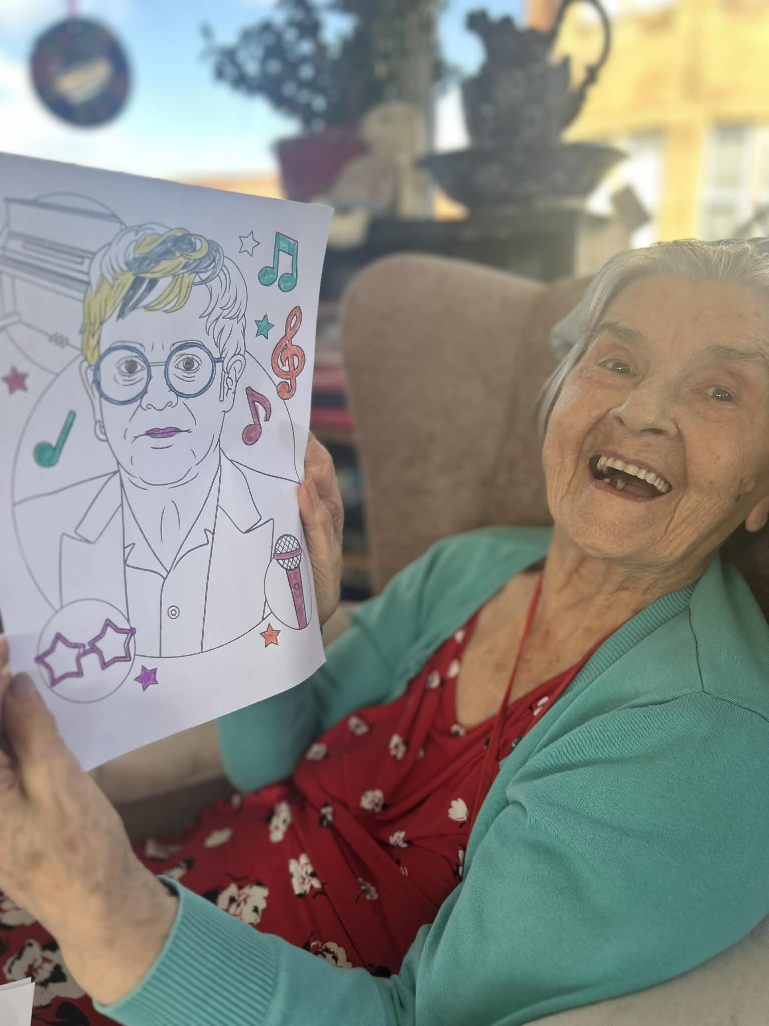 A very proud Herta holding Elton colouring