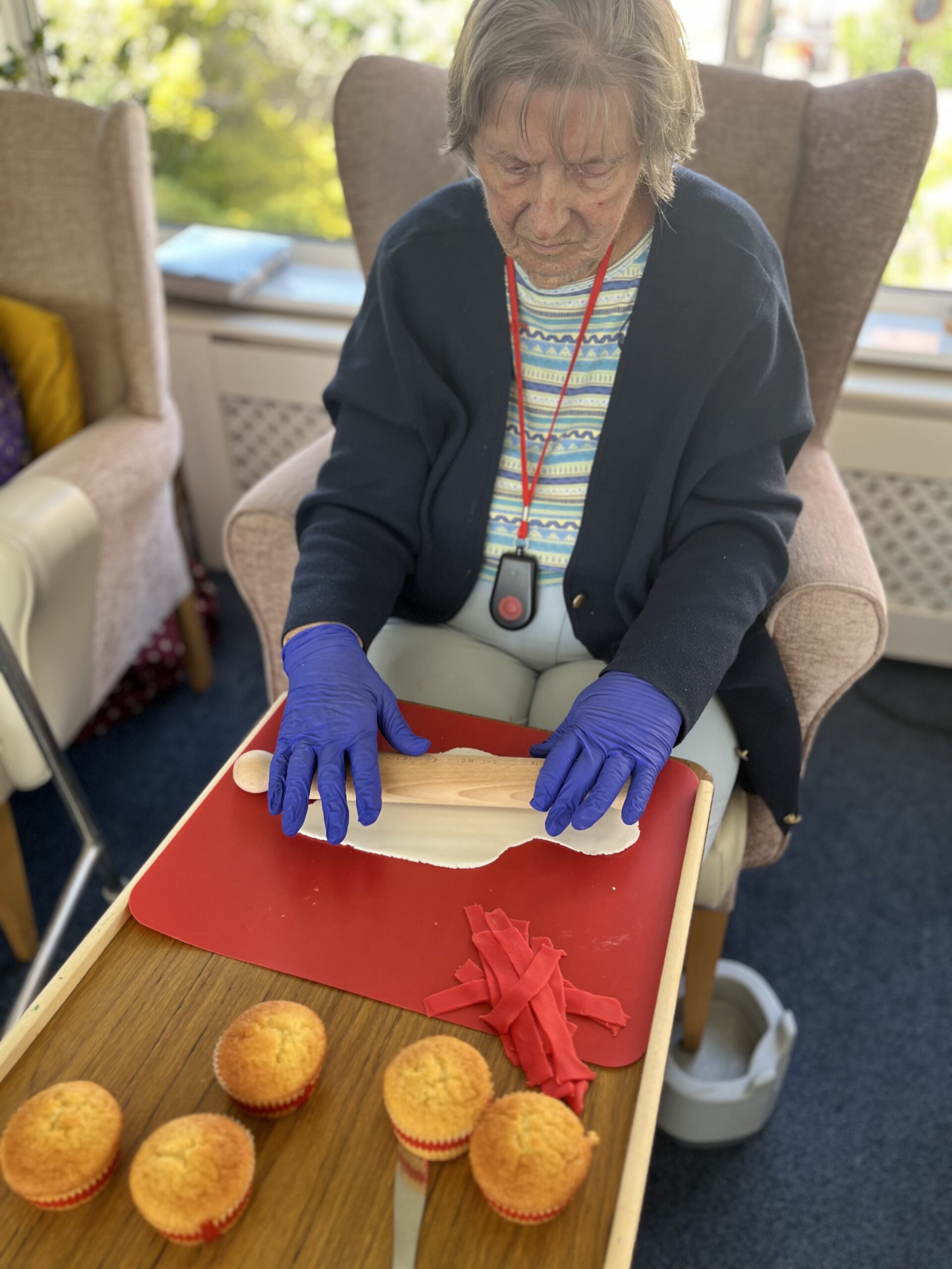 Barb rolling out white icing for cupcake decoration scaled