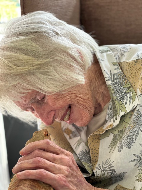 Deirdre stroking a Bearded Dragon