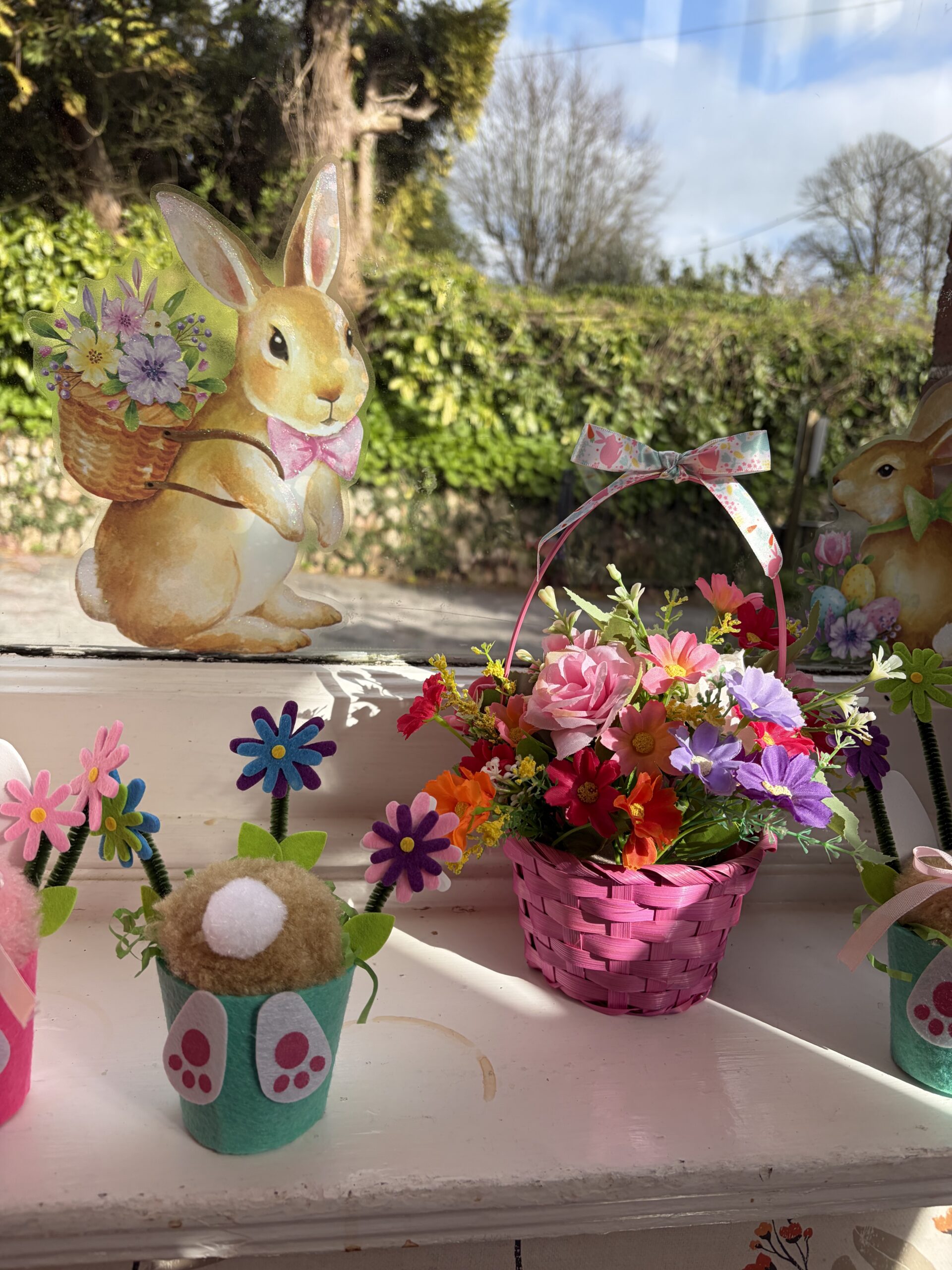 Easter baskets filled with flowers and Easter decorations