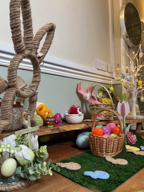 Easter display of eggs, bunnies, chicks and flowers