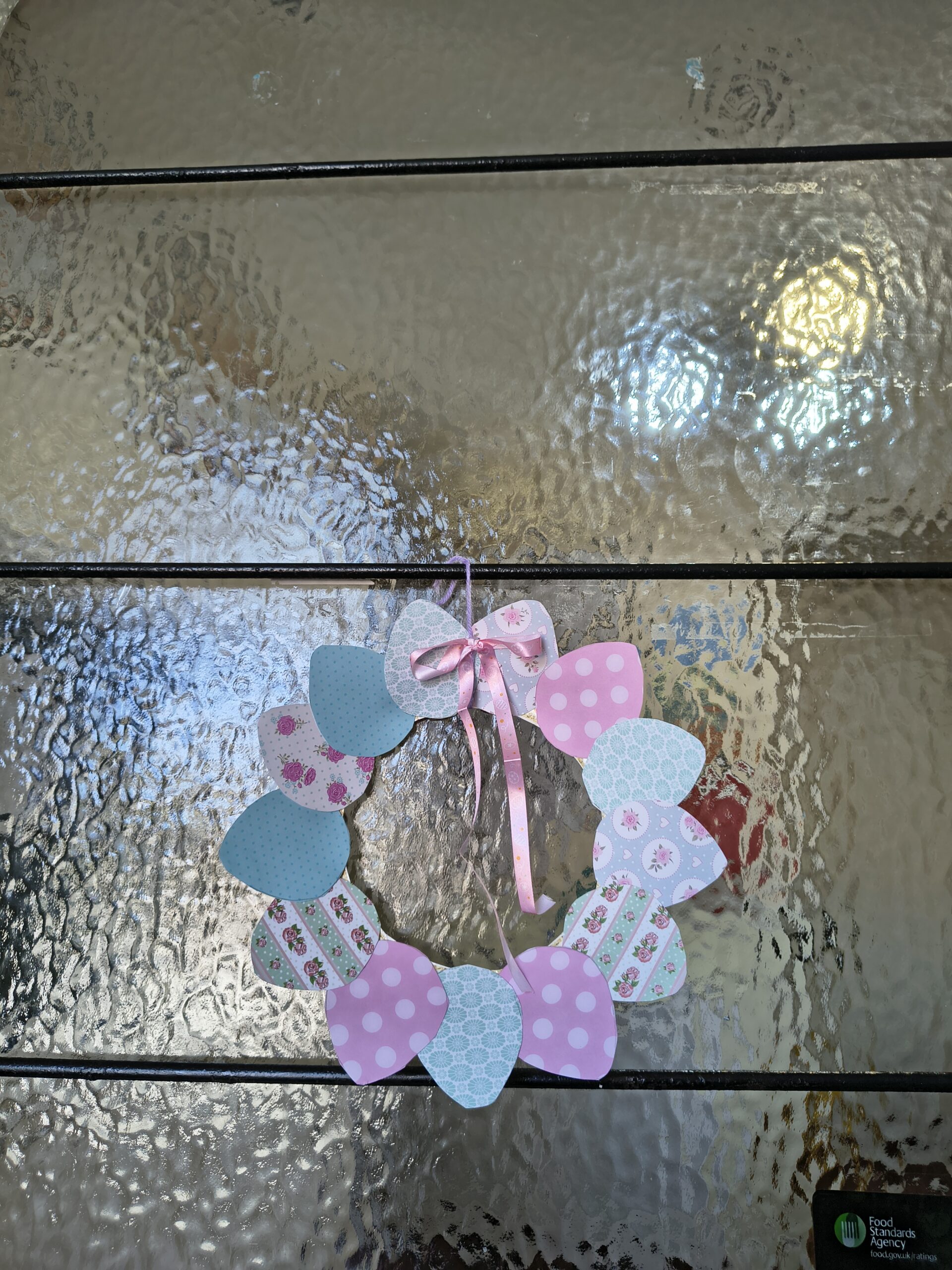 Finished wreath hanging on glass door 1 scaled