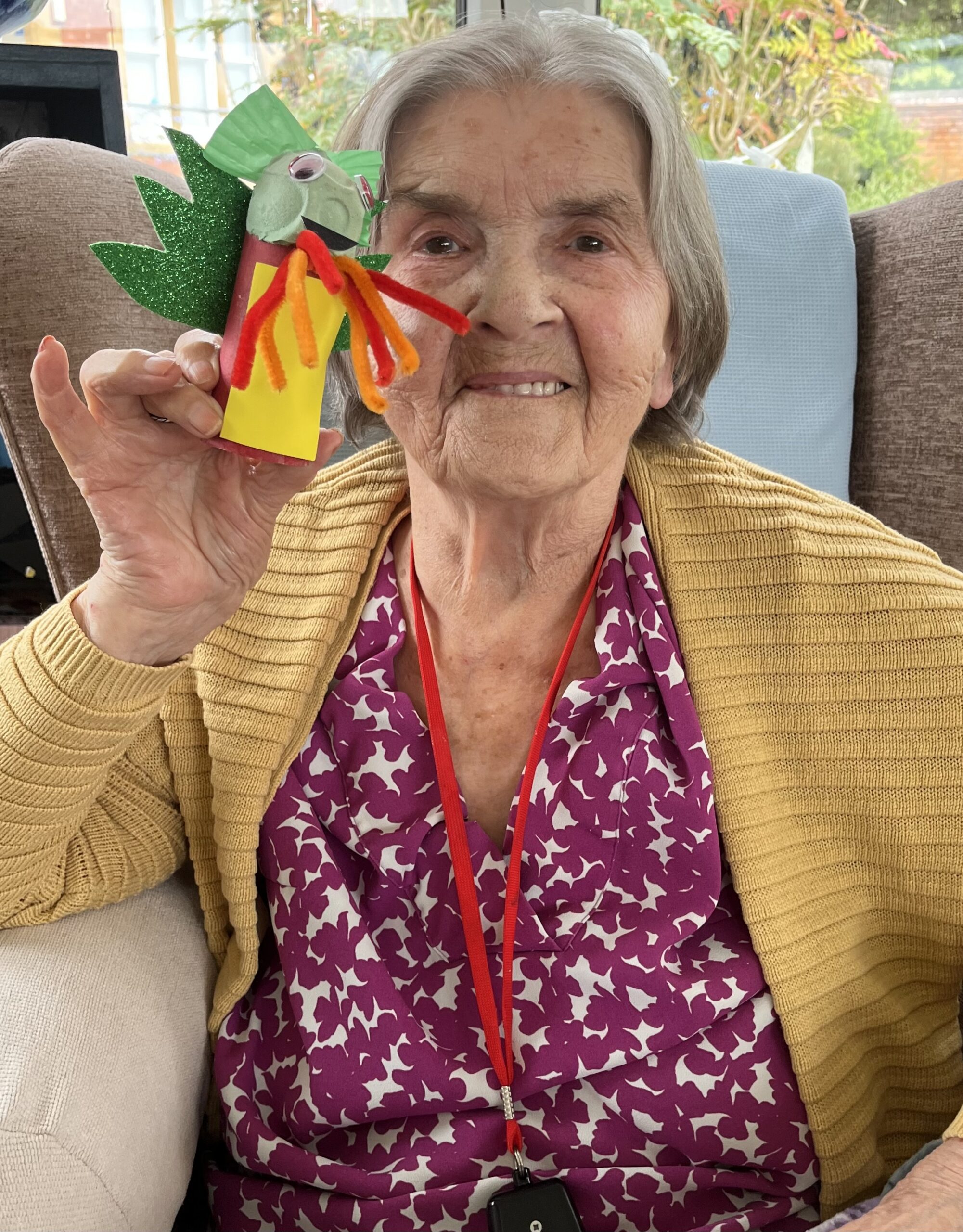 Herta showing her finished dragon smiling