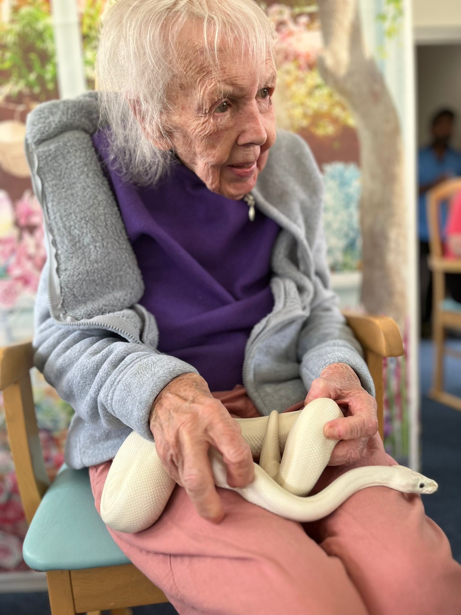 Mary with a white snake on her lap