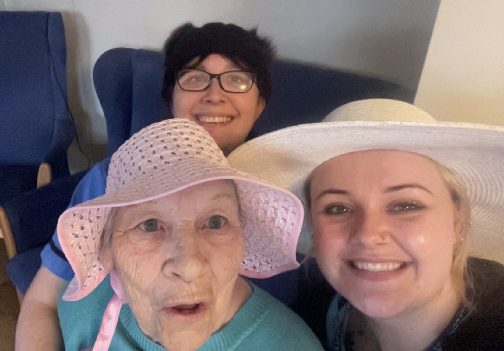Paula carer Ange and Hannah carer wearing hats