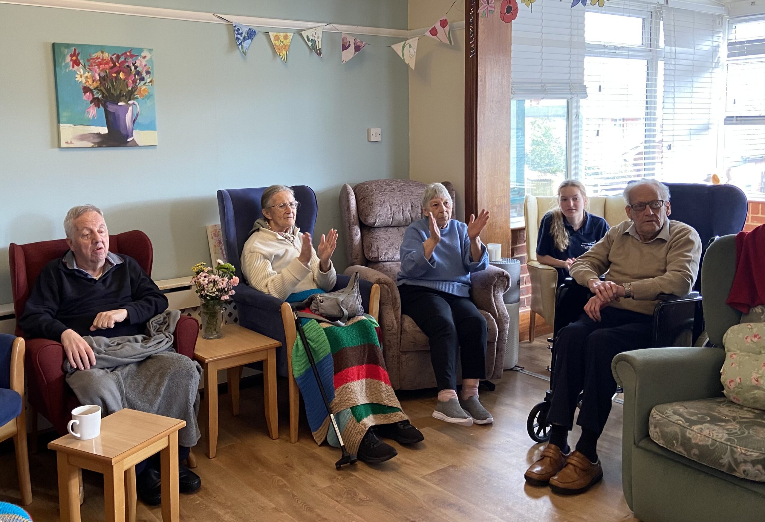 Pete, Lesley, Ange & Tim seated, listening to the music