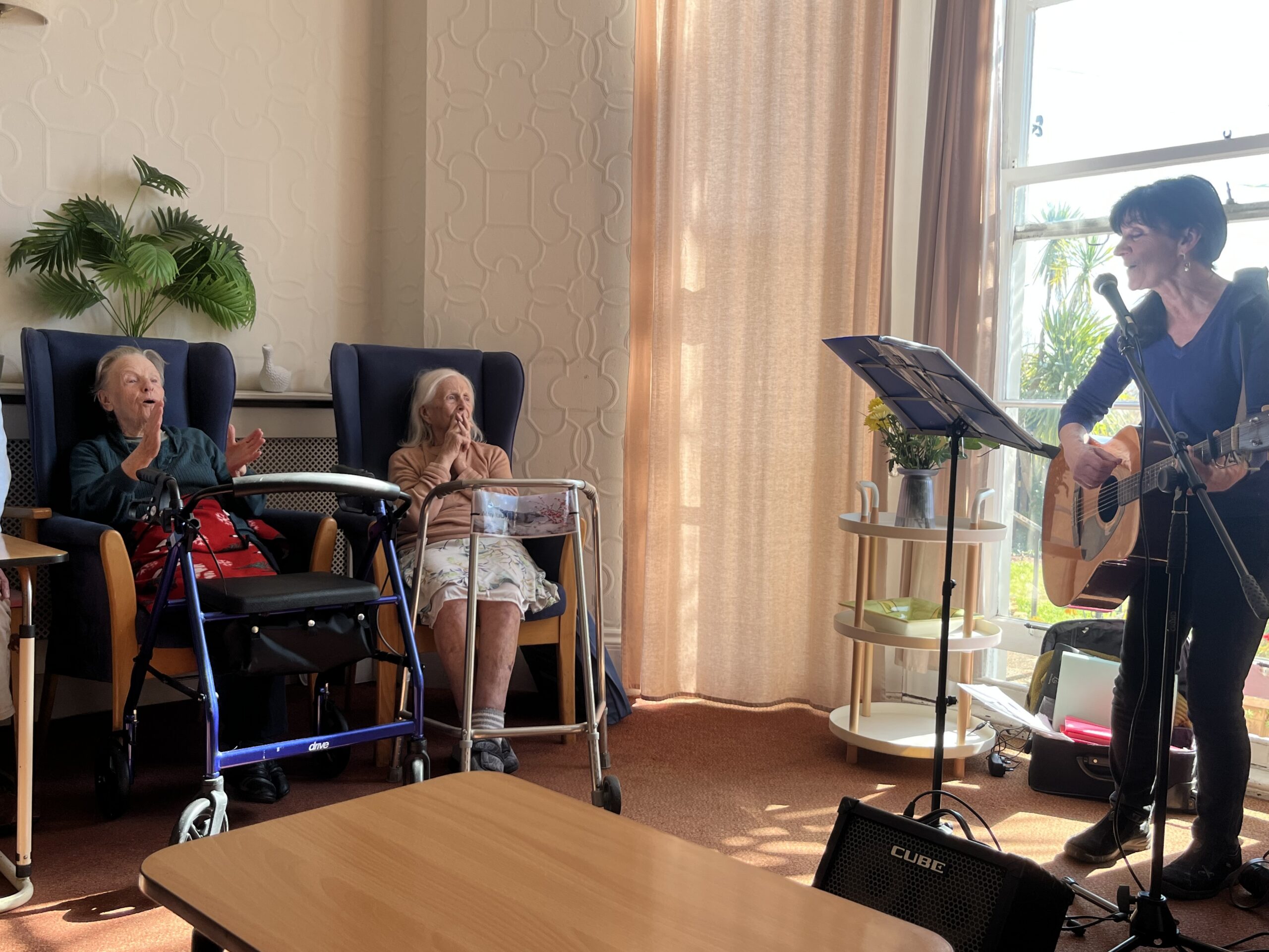 Resident Mary singing scaled