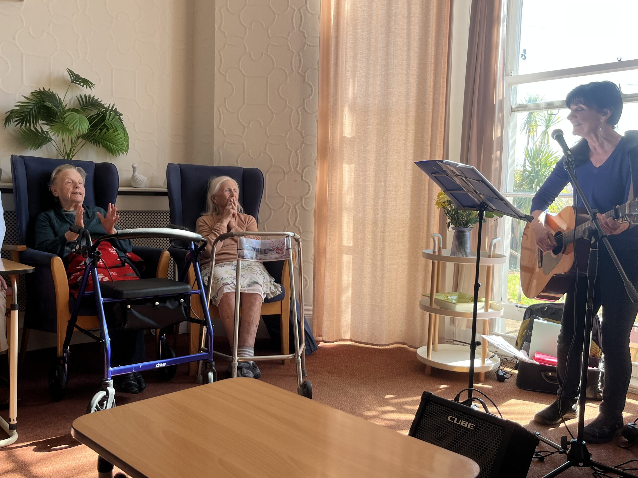 Residents Sheila and Mary enjoying the music scaled
