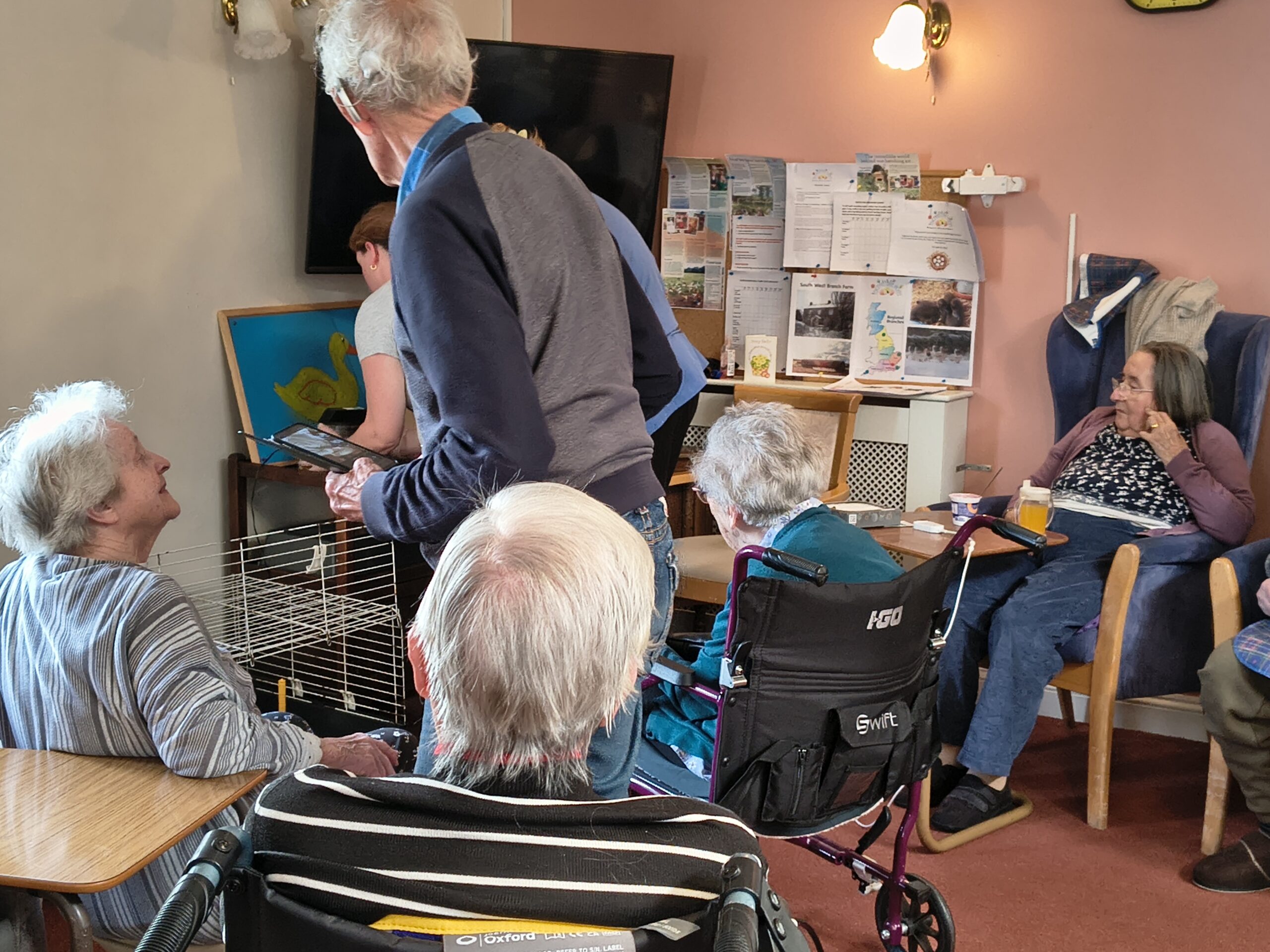 Residents gathered around the incubator scaled