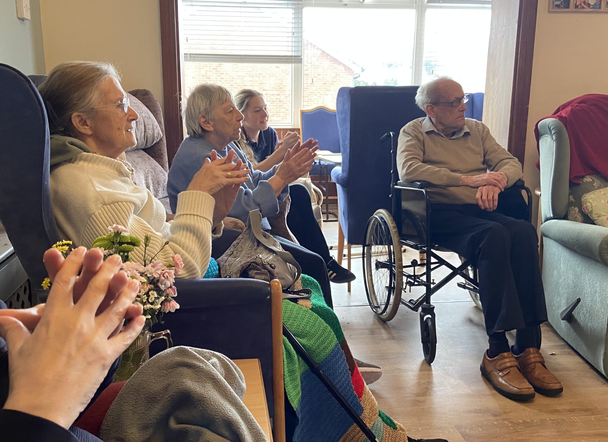 Residents joining in The Hokey Cokey