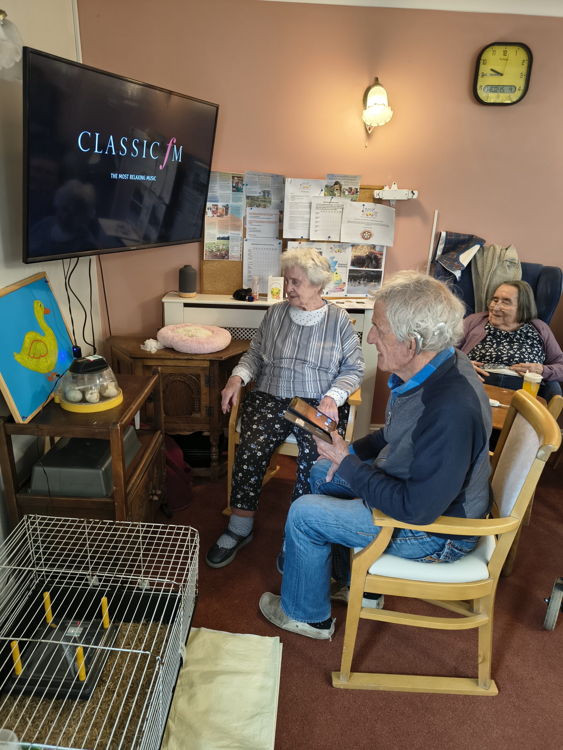 Residents seated around the incubator scaled