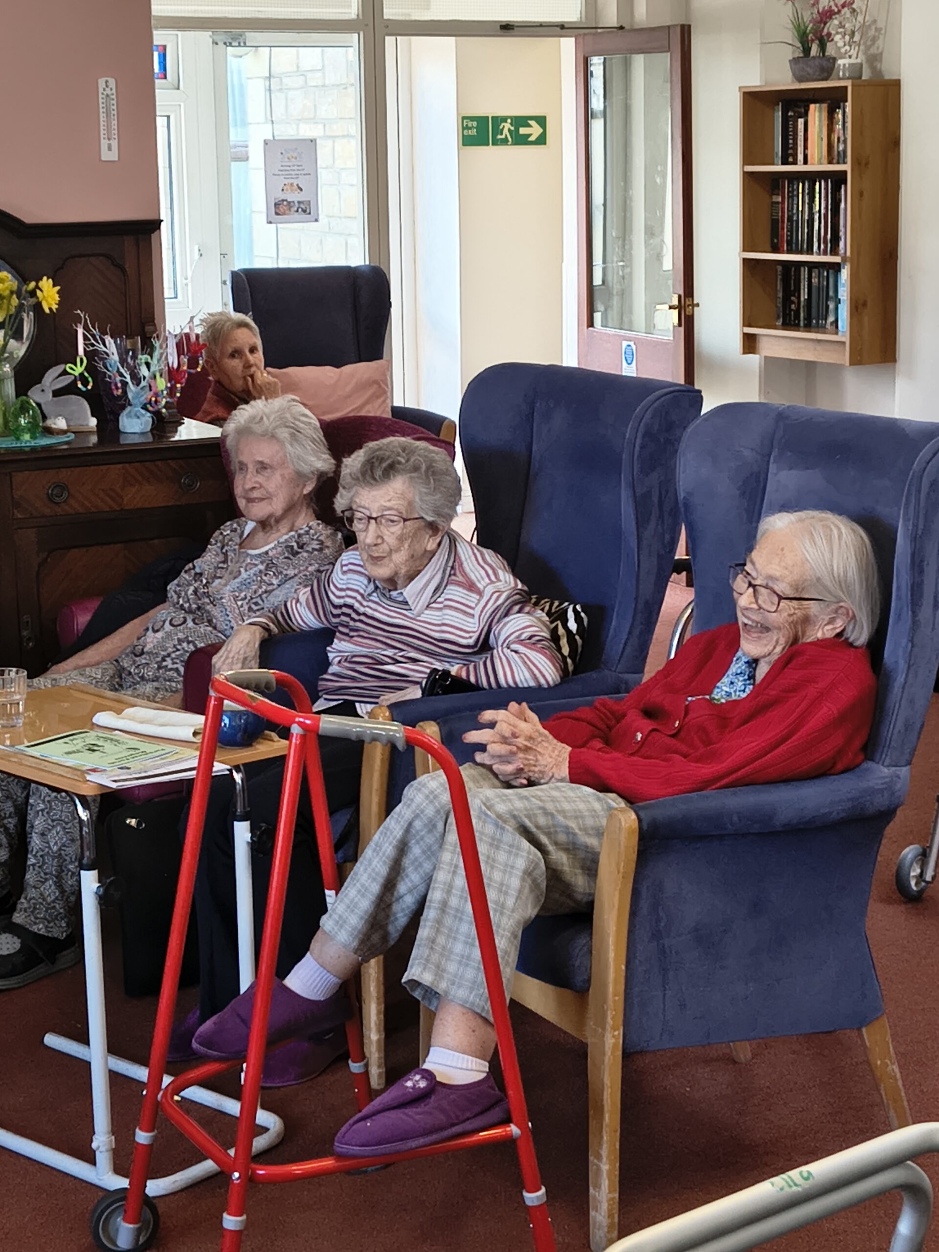 Residents watching Alison and smiling scaled