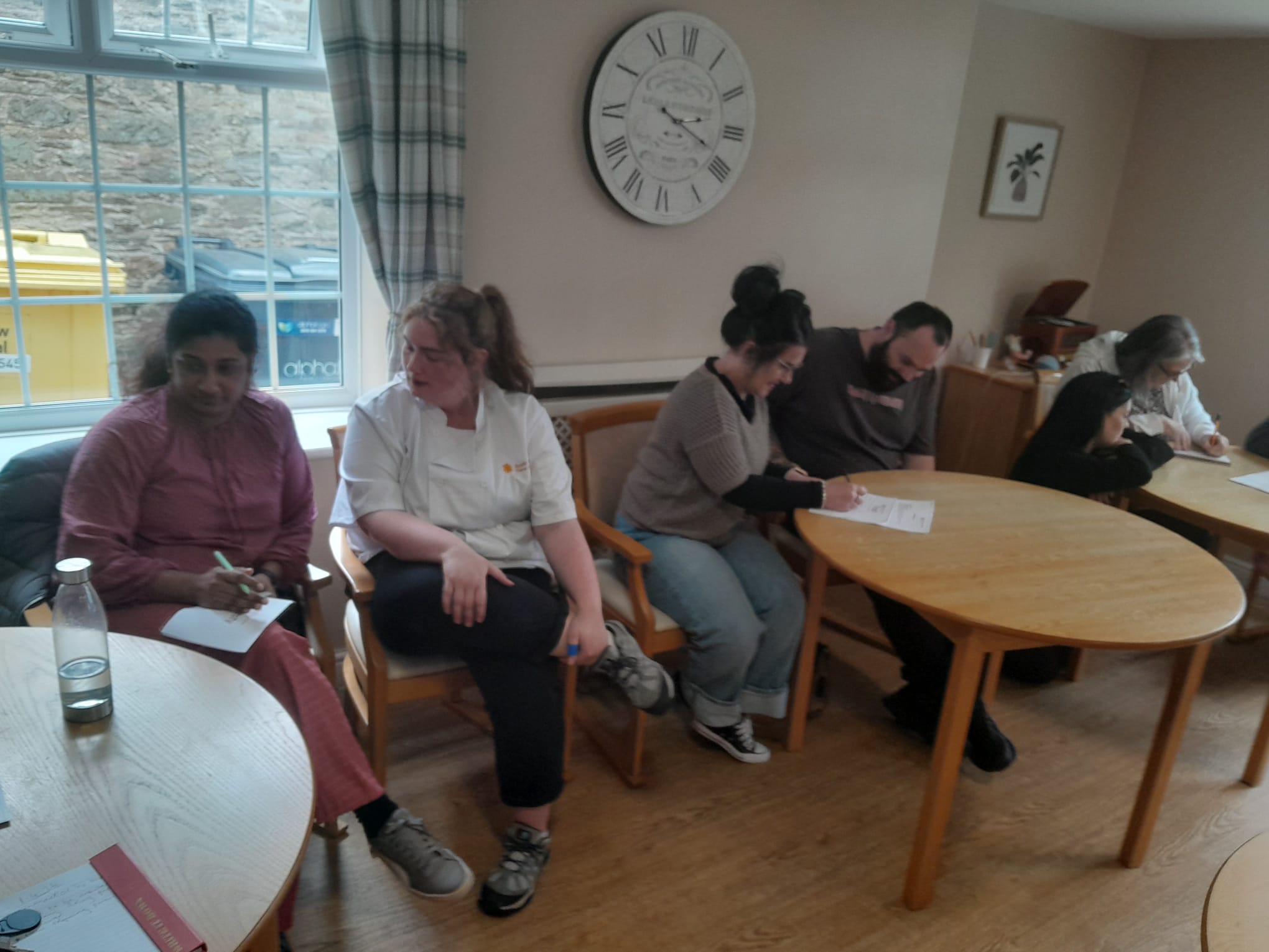 Two groups concentrating on the company values exercise