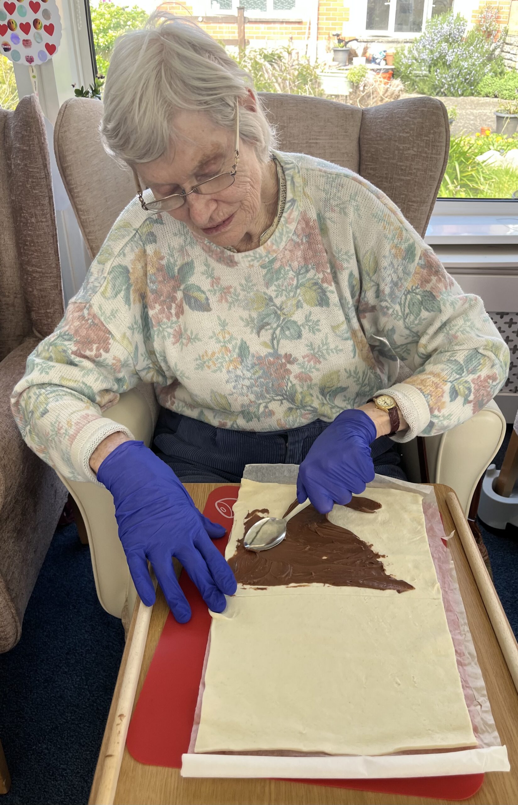 Wendy spreading chocolate