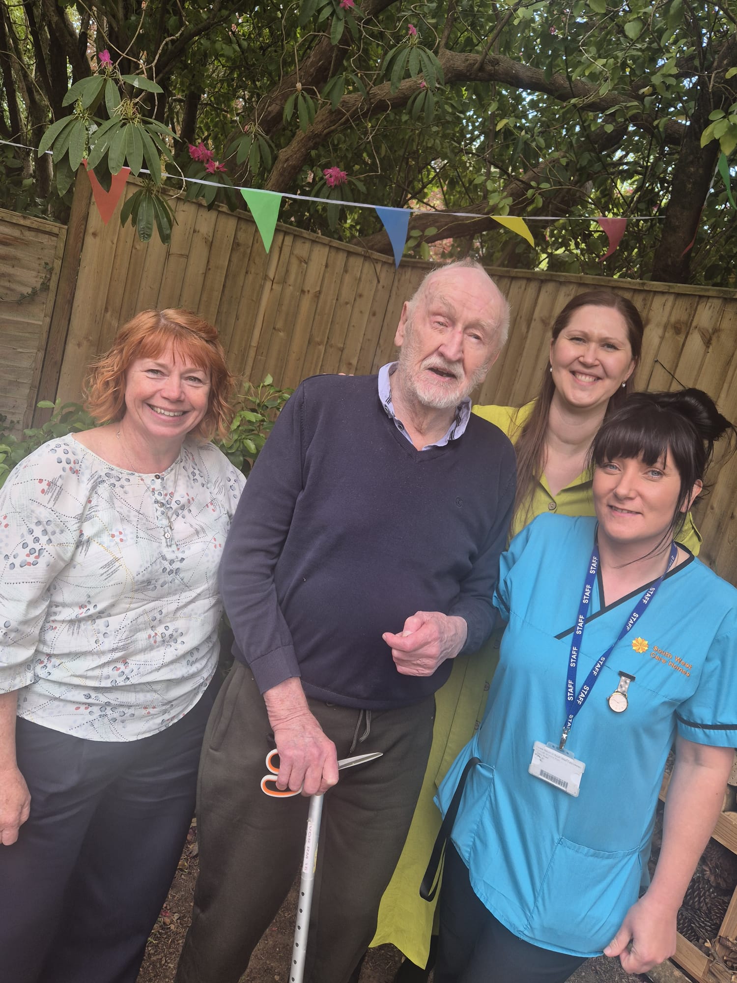 Amanda, Ivor, Janka and Billie standing together for a photo in the garden